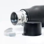 Open view of the HL NOVA matte black 750ml water bottle showing the premium stainless steel interior and threaded lid with a grey carrying strap.