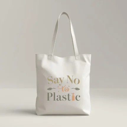 Durable eco-friendly white canvas tote bag with a minimalist typographic design in earth tones. The text 'Say No to Plastic' is printed in olive green and soft orange, accented with small leaf and seedling illustrations.