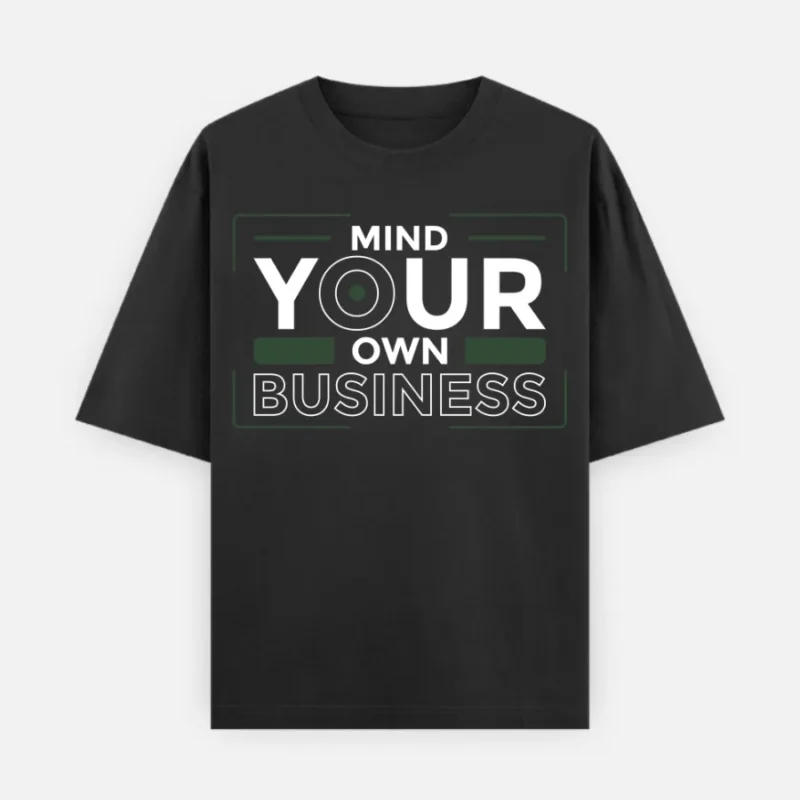 240 GSM Oversized graphic tee with 'Mind Your Own Business' typography, minimalist streetwear design.240 GSM Oversized black graphic tee with 'Mind Your Own Business' typography, minimalist streetwear design.