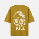 Mustard Yellow 240 GSM cotton oversized printed t-shirt back with a lion graphic and the phrase A LION NEVER ROARS AFTER A KILL.