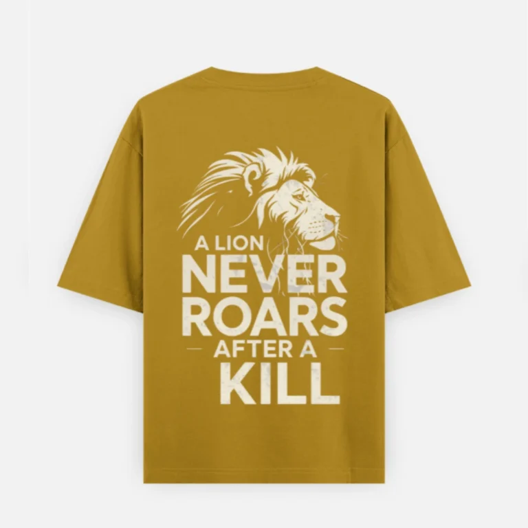 Mustard Yellow 240 GSM cotton oversized printed t-shirt back with a lion graphic and the phrase A LION NEVER ROARS AFTER A KILL.